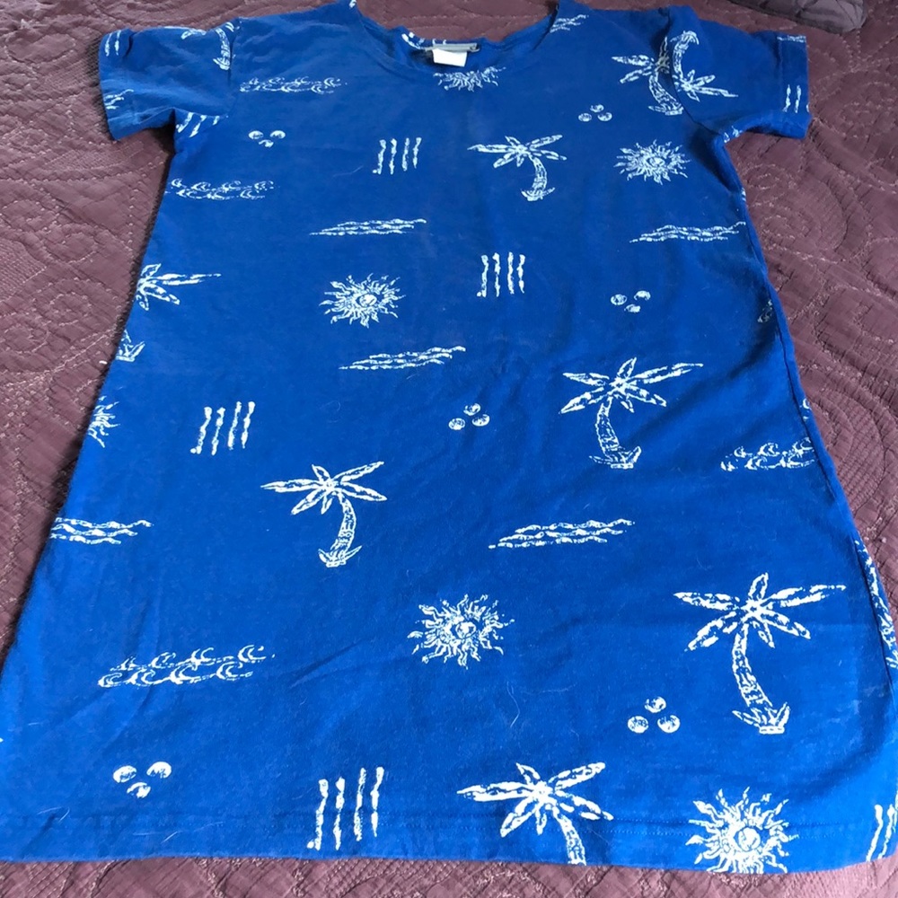 T shirt dress or bathing suit cover up. Super cute